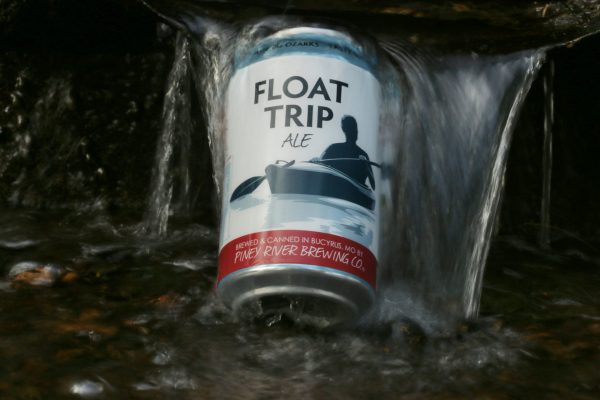 Piney River Brewing Co. PRBC Float Trip can in river