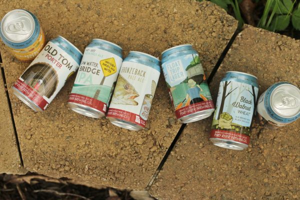 Piney River Brewing Co. flagship beers in outdoor environment, June 2026.